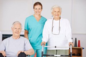 A home health aide in Florida with two elderly couple.