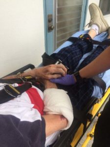 Injured patient during transfer from wheelchair to bed